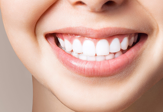 Smiling person showing white teeth