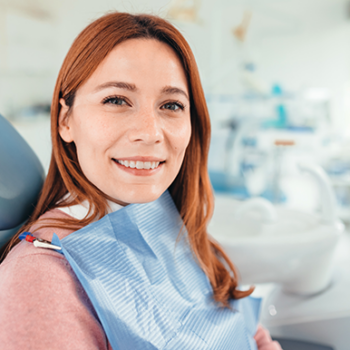 Smiling woman in dental chair