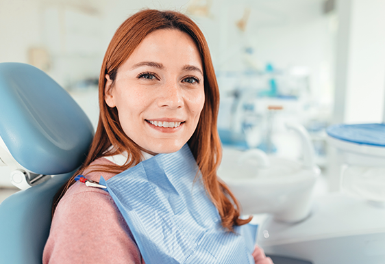Smiling woman in dental chair