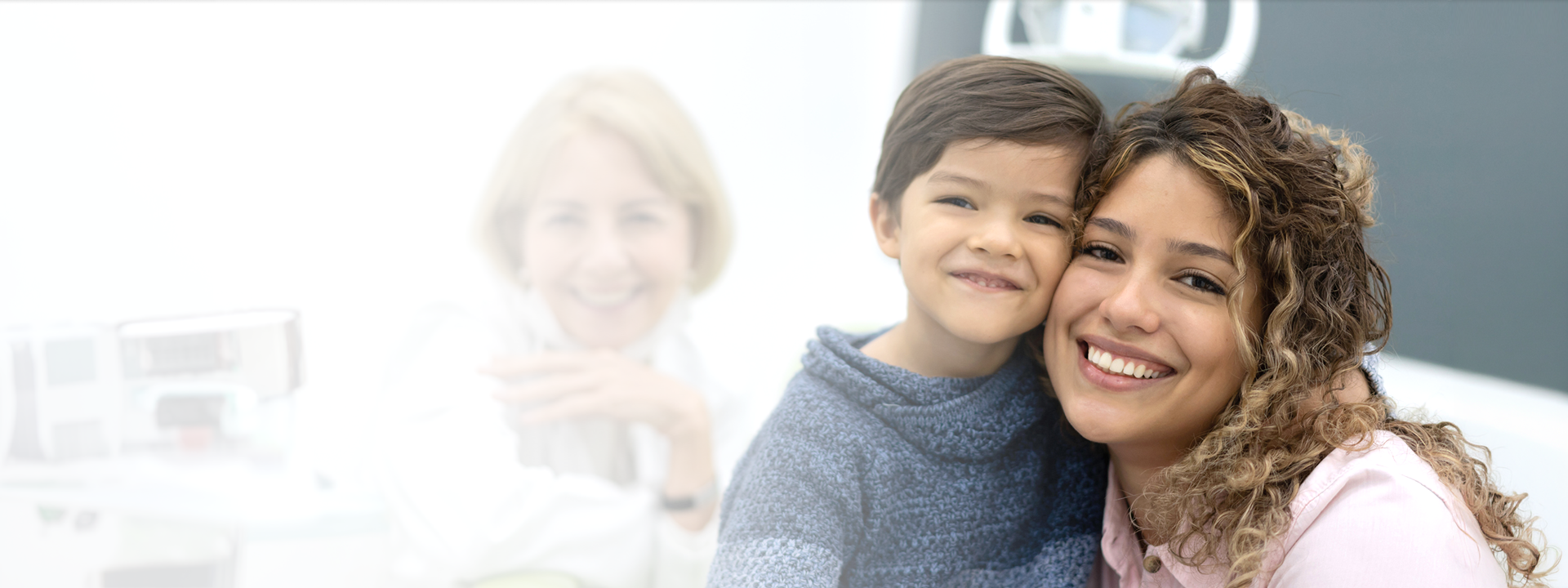 Smiling woman child dentist chair